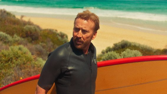 The Surfer is Wake in Fright, with waves and wetsuits